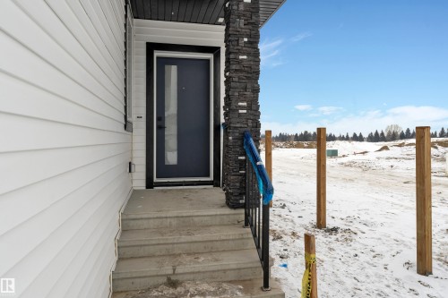 View of snow covered property entrance - 40 Grayson Green, Stony Plain, AB - Outdoor
