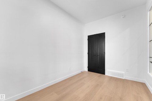 Unfurnished bedroom featuring light wood finished floors and a closet - 40 Grayson Green, Stony Plain, AB - Indoor Photo Showing Other Room