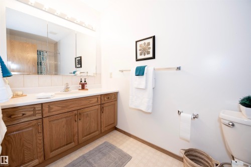 Convenient second bath located at Garage Entry - 12A Invermere Place, St. Albert, AB - Indoor Photo Showing Bathroom