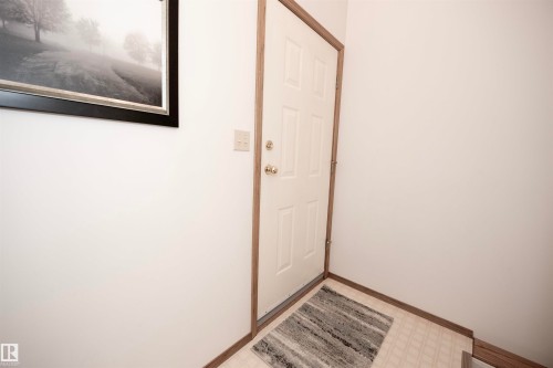 Separate Entrance leading downstairs, perfect for guests. - 12A Invermere Place, St. Albert, AB - Indoor Photo Showing Other Room