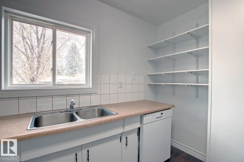 10682 61 Avenue, Edmonton, AB - Indoor Photo Showing Kitchen With Double Sink