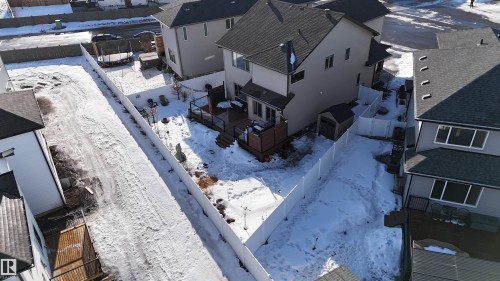 Snowy aerial view with a residential view - 97 Astoria Point(E), Devon, AB - Outdoor