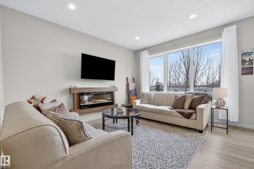 2 50 Edinburgh Crt, St. Albert, AB - Indoor Photo Showing Living Room With Fireplace
