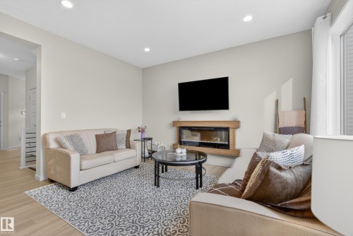 2 50 Edinburgh Crt, St. Albert, AB - Indoor Photo Showing Living Room With Fireplace