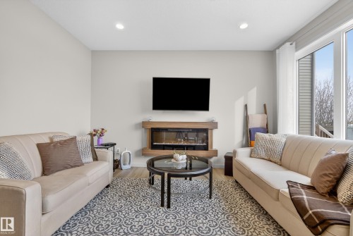 2 50 Edinburgh Crt, St. Albert, AB - Indoor Photo Showing Living Room With Fireplace