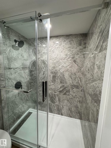 3 piece ensuite with walk in shower - 505 10149 Saskatchewan Drive, Edmonton, AB - Indoor Photo Showing Bathroom