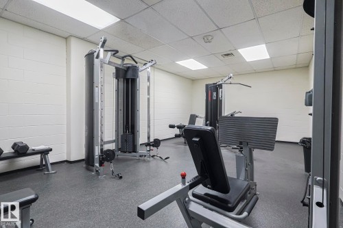 Exercise room with a drop ceiling - 505 10149 Saskatchewan Drive, Edmonton, AB - Indoor Photo Showing Gym Room