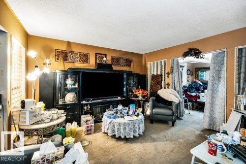 View of carpeted living room - 11436 71 Street, Edmonton, AB - Indoor Photo Showing Other Room