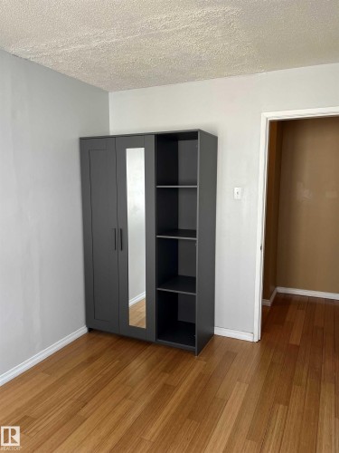 View of closet - 203 8524 Gateway Boulevard, Edmonton, AB - Indoor Photo Showing Other Room