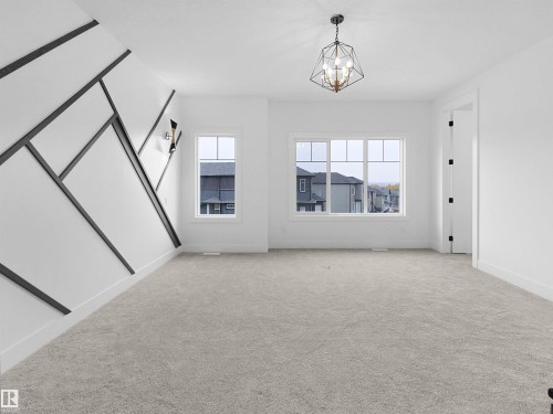 1107 Gyrfalcon Crescent, Edmonton, AB - Indoor Photo Showing Other Room