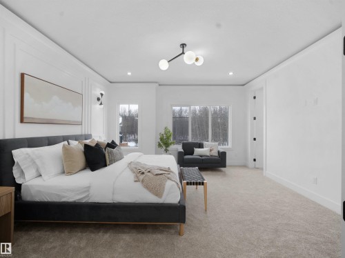 Carpeted bedroom with baseboards and recessed lighting - 1168 Gyrfalcon Crescent, Edmonton, AB - Indoor Photo Showing Bedroom