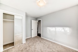 Unfurnished bedroom featuring a closet and carpet flooring - 