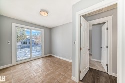 Bedroom #3 with access to the back yard deck. This room can also be used as an office/den - 