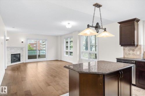 304 10142 111 Street, Edmonton, AB - Indoor With Fireplace