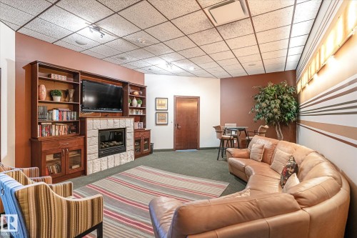 507 10142 111 Street, Edmonton, AB - Indoor With Fireplace