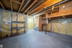 Unfinished below grade area with stairway - 