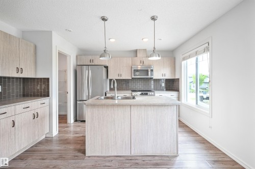 3 2215 24 Street, Edmonton, AB - Indoor Photo Showing Kitchen With Stainless Steel Kitchen With Double Sink With Upgraded Kitchen