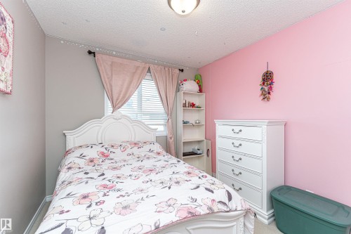 Bedroom featuring a textured ceiling - 192 Keyport Circle, Leduc, AB - Indoor Photo Showing Bedroom
