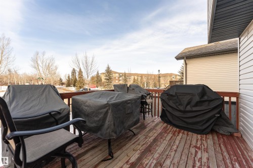 Deck featuring a grill - 192 Keyport Circle, Leduc, AB - Outdoor With Exterior