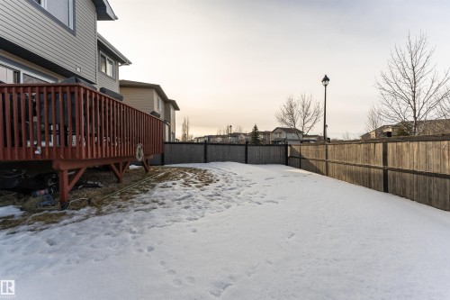 Fenced backyard featuring a deck - 192 Keyport Circle, Leduc, AB - Outdoor