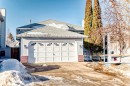 View of home's exterior featuring brick siding, driveway, and a shingled roof - 6 Jefferson Road, Edmonton, AB 