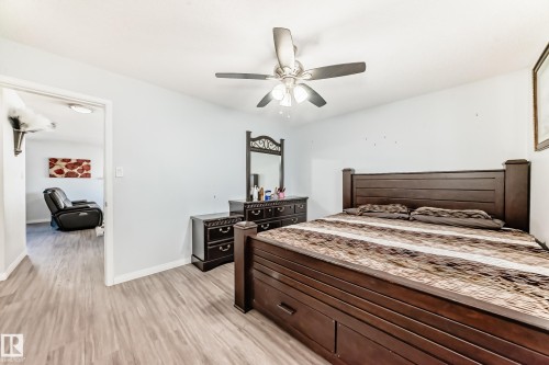 Bedroom featuring light wood-type flooring and a ceiling fan - 6 Jefferson Road, Edmonton, AB 