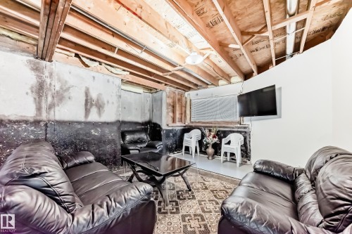 Living room with concrete flooring - 6 Jefferson Road, Edmonton, AB 