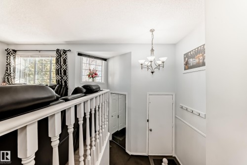 Foyer with baseboards and suspended lighting - 6 Jefferson Road, Edmonton, AB 