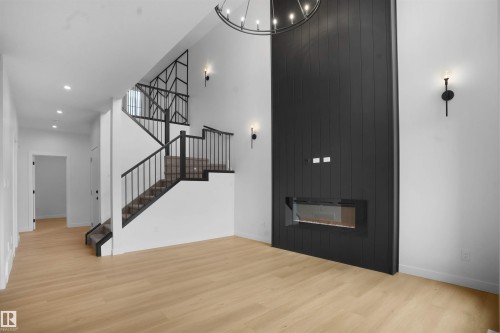 806 Elderberry Crest, Edmonton, AB - Indoor Photo Showing Other Room With Fireplace