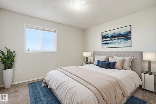 Bedroom featuring carpet flooring - 8006 15A Avenue, Edmonton, AB - Indoor Photo Showing Bedroom