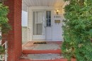 Entrance to property featuring a porch - 8006 15A Avenue, Edmonton, AB  - Outdoor With Exterior 