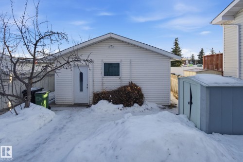 Snow covered property featuring a shed - 8006 15A Avenue, Edmonton, AB - Outdoor With Exterior