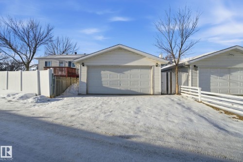 View of front facade featuring a detached garage and an outdoor structure - 8006 15A Avenue, Edmonton, AB - Outdoor