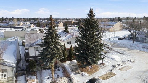 Snowy aerial view featuring a residential view - 8006 15A Avenue, Edmonton, AB - Outdoor With View