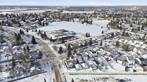 Snowy aerial view featuring a residential view - 8006 15A Avenue, Edmonton, AB - Outdoor With View