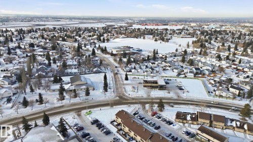 Snowy aerial view featuring a residential view - 8006 15A Avenue, Edmonton, AB - Outdoor With View