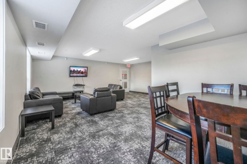 Common lounge area for building residents. - 419 396 Silverberry Road, Edmonton, AB - Indoor