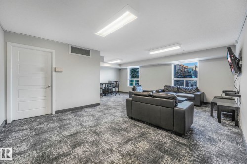 Common lounge area for building residents. - 419 396 Silverberry Road, Edmonton, AB - Indoor
