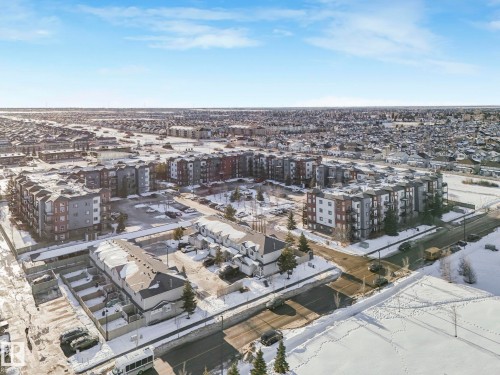 Aerial overview of property's location with nearby urban area - 419 396 Silverberry Road, Edmonton, AB - Outdoor With View