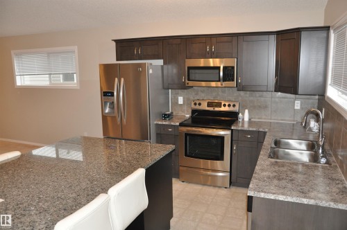 159, 142 Place, Leduc, AB - Indoor Photo Showing Kitchen With Stainless Steel Kitchen With Double Sink