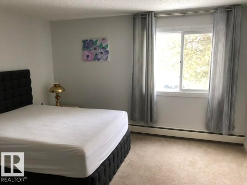 201 14825 51 Avenue, Edmonton, AB - Indoor Photo Showing Bedroom