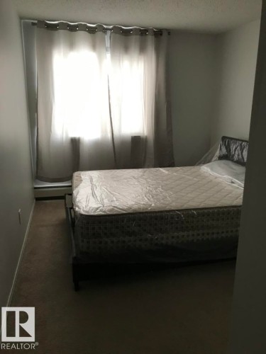 201 14825 51 Avenue, Edmonton, AB - Indoor Photo Showing Bedroom