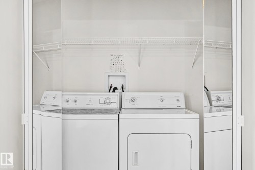 main floor laundry - 2 Creekside Way, Spruce Grove, AB - Indoor Photo Showing Laundry Room