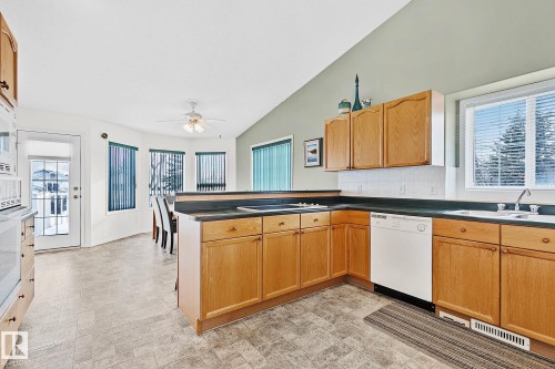 Plenty of cupboard, large pantry, lots of counter space - 2 Creekside Way, Spruce Grove, AB - Indoor Photo Showing Kitchen