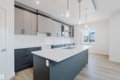 134 Mitchell Bend, Leduc, AB - Indoor Photo Showing Kitchen With Double Sink