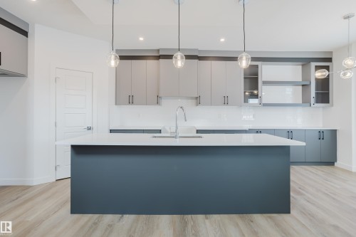 134 Mitchell Bend, Leduc, AB - Indoor Photo Showing Kitchen With Upgraded Kitchen