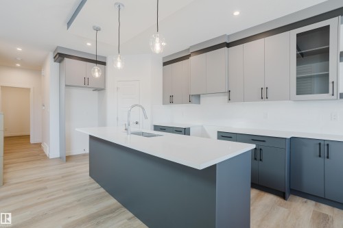 134 Mitchell Bend, Leduc, AB - Indoor Photo Showing Kitchen With Upgraded Kitchen