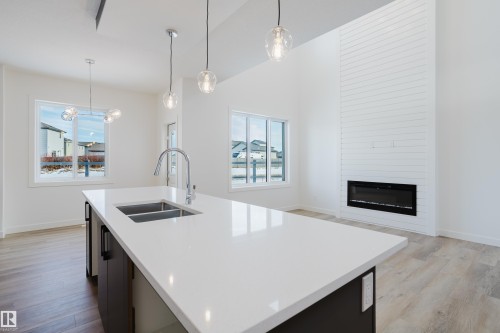 134 Mitchell Bend, Leduc, AB - Indoor Photo Showing Kitchen With Double Sink With Upgraded Kitchen