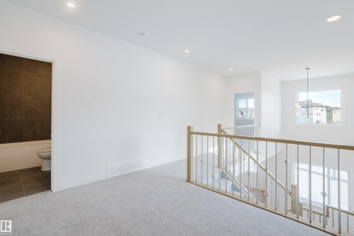 134 Mitchell Bend, Leduc, AB - Indoor Photo Showing Other Room