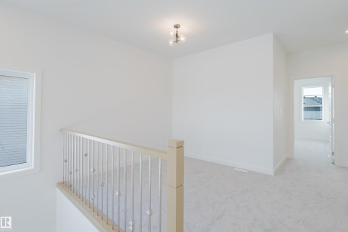 134 Mitchell Bend, Leduc, AB - Indoor Photo Showing Other Room